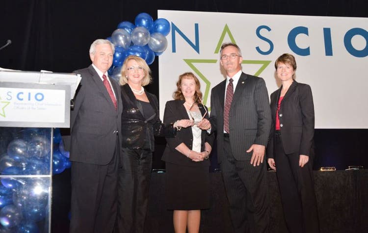 Accepting the award are Tom Rolfes and Jayne Scofield, Office of the CIO. Also pictured are (L to R) Stu Davis, Clair Bailey, NASCIO Awards Co-Chairs, and NASCIO President, Brenda Decker.